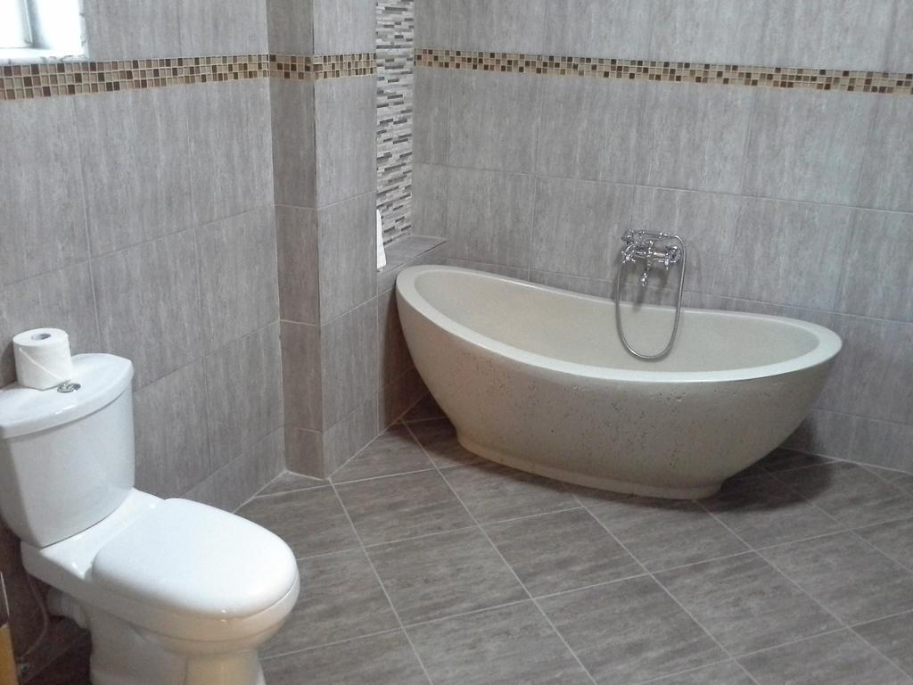 Tropical Enclave Hotel Accra Ruang foto